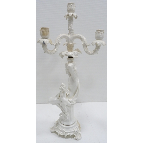 227 - In the Manner of MeissenNear pair of 19th century blanc de chine glazed Rococo-inspired candelabra o... 