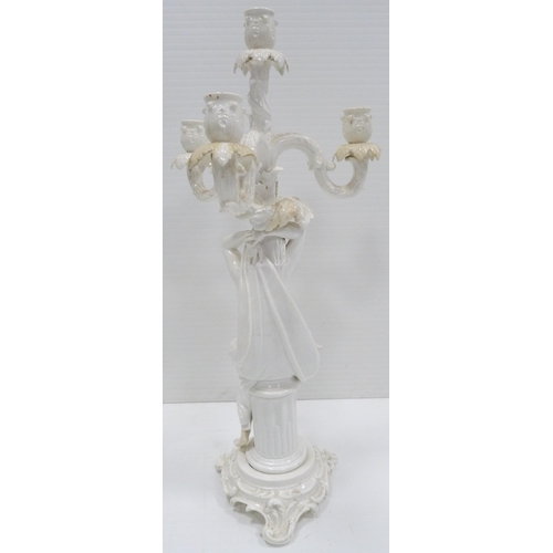 227 - In the Manner of MeissenNear pair of 19th century blanc de chine glazed Rococo-inspired candelabra o... 