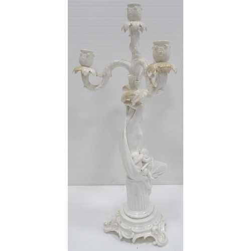 227 - In the Manner of MeissenNear pair of 19th century blanc de chine glazed Rococo-inspired candelabra o... 