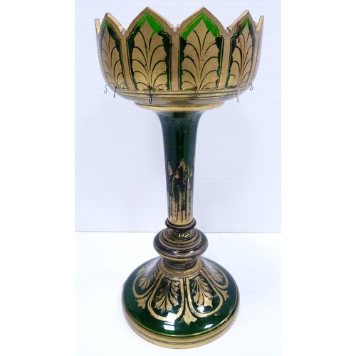 258 - Victorian green glass table lustre of large form decorated all over with gilded leaf vignettes and f... 