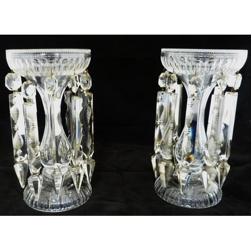 259 - Pair of Victorian clear glass table lustres, each with a flaring bowl and suspended glass faceted dr... 