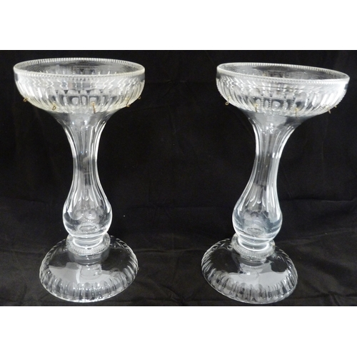 259 - Pair of Victorian clear glass table lustres, each with a flaring bowl and suspended glass faceted dr... 