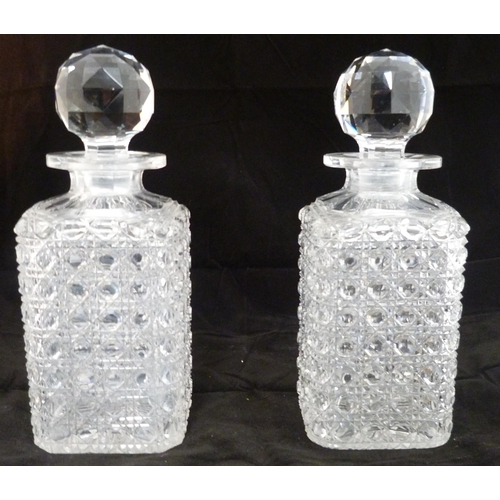 219 - Victorian coromandel two-bottle tantalus with applied white metal mounts and handle, containing two ... 