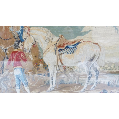 312 - Victorian needlepoint tapestry panel depicting a Baron on horseback and a boy with a horse, glazed i... 