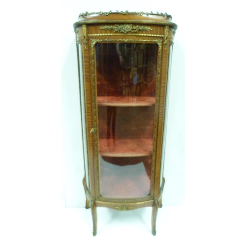 414 - Louis XV style vitrine cabinet with glazed door and side panels enclosing red velour-lined shelving,... 