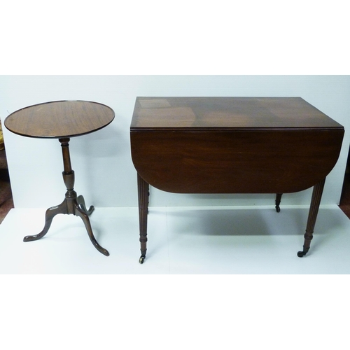 417 - 19th century mahogany Pembroke table with drawer to one end and opposing faux drawer, on reeded supp... 