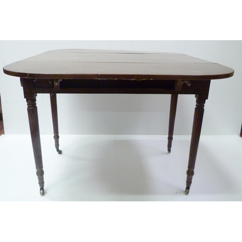 417 - 19th century mahogany Pembroke table with drawer to one end and opposing faux drawer, on reeded supp... 