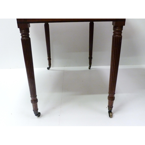 417 - 19th century mahogany Pembroke table with drawer to one end and opposing faux drawer, on reeded supp... 