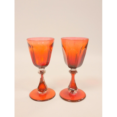 219 - 19th century Bohemian faceted ruby overlay goblet with gilt rim, etched foliate decoration to the cl... 