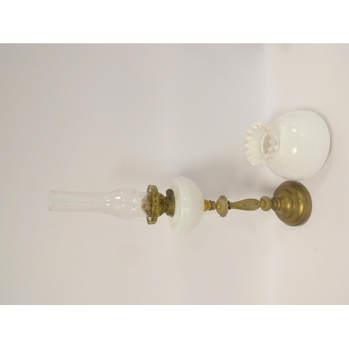 327 - Antique brass duplex oil lamp, stamped to the wick, with opaque glass reservoir and shade, with late... 