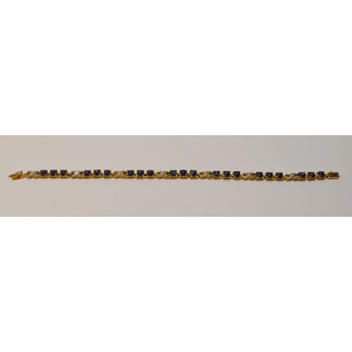 92 - Cabochon sapphire and diamond bracelet, in 9ct gold, 21cm long, 11.5g gross.