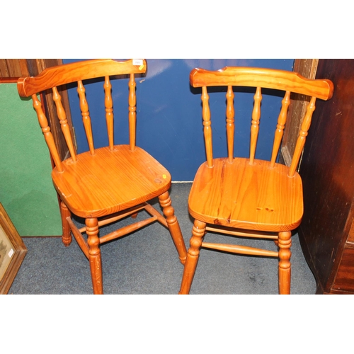 709 - Two modern pine kitchen chairs.