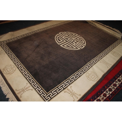 719 - Chinese wash wool rug 199cm x 285cm and a smaller rug, 170cm x 120cm.