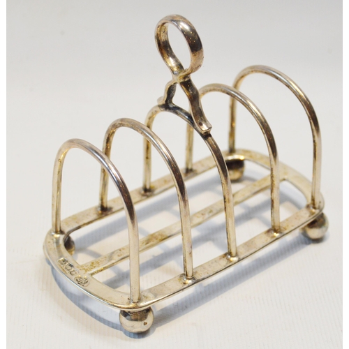 2 - Three silver toast racks, various, 200g gross.