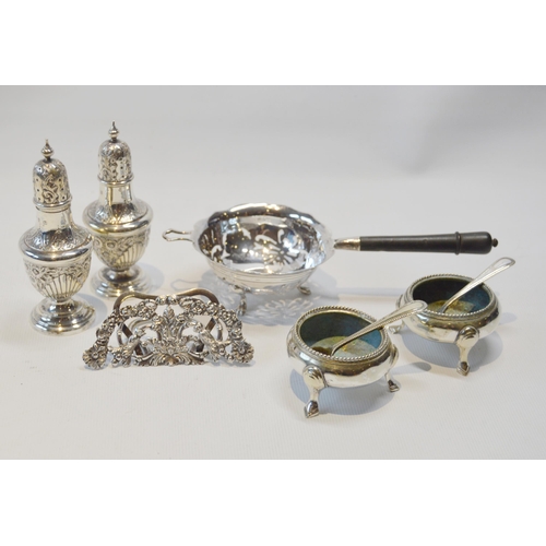 4 - Pair of silver pepperettes, a silver tea strainer and silver menu holder, 118g gross, also a pair of... 