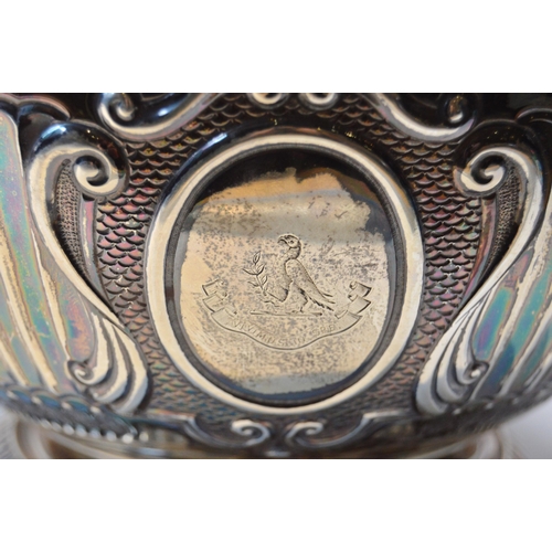 25 - Silver bowl of late 17th century Monteith style, embossed, with lion mask and drop handles, by Hamil... 