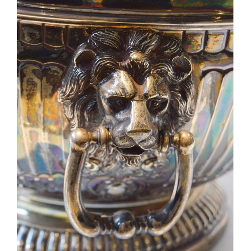 25 - Silver bowl of late 17th century Monteith style, embossed, with lion mask and drop handles, by Hamil... 