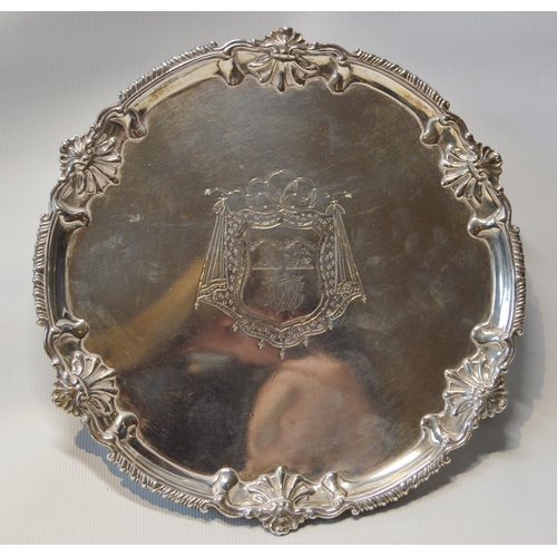 32 - Silver circular waiter, crested with hexafoil border, by Richard Rugg, 1760, 20cm, 298g.