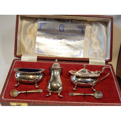 33 - Silver goblet, Prince of Wales Investiture 1969, and two silver three-piece condiment sets with spoo... 