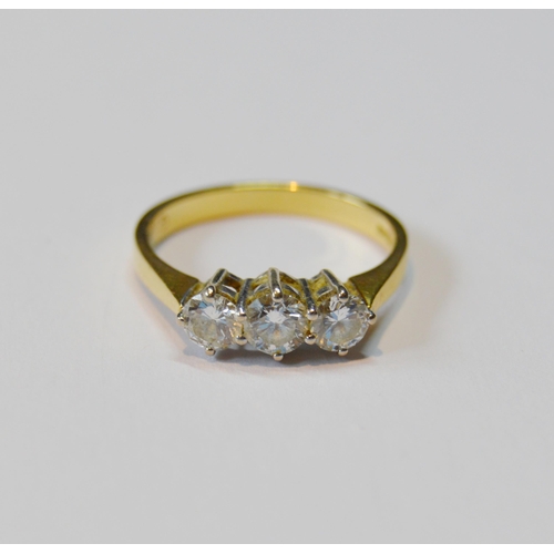 105 - Diamond three-stone ring with brilliants, approximately .25ct each, total diamond content approximat... 