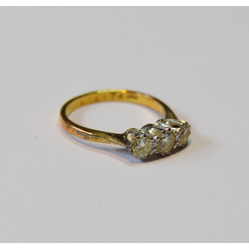 106 - Diamond three-stone ring set with pale champagne brilliants, in 18ct gold, total diamond content app... 