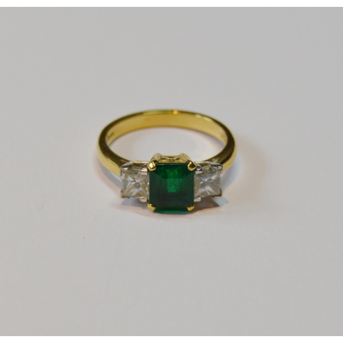 108 - Diamond and emerald three stone ring set with princess-cut brilliants, with a larger cut emerald to ... 