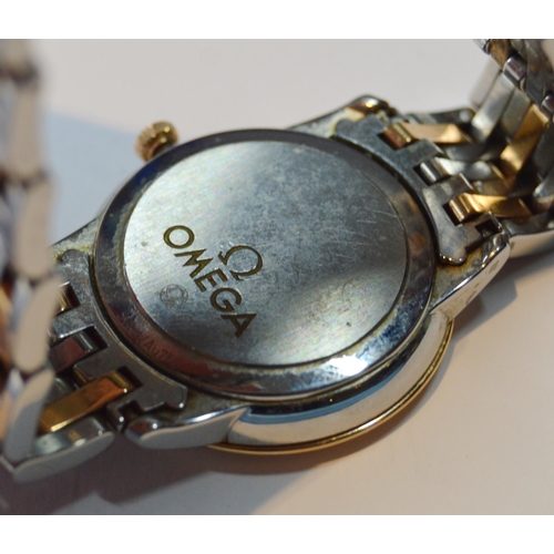 179 - Omega De Ville lady's bracelet watch, quartz, with mother of pearl dial, in gold and stainless steel... 