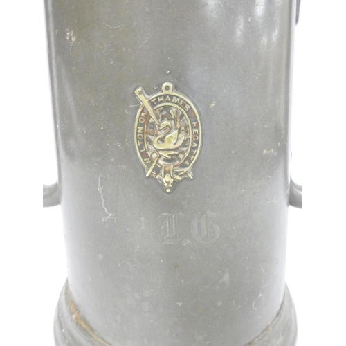 236 - 19th century prize pewter twin handled tankard, of large form, bearing crest to the obverse for Walt... 