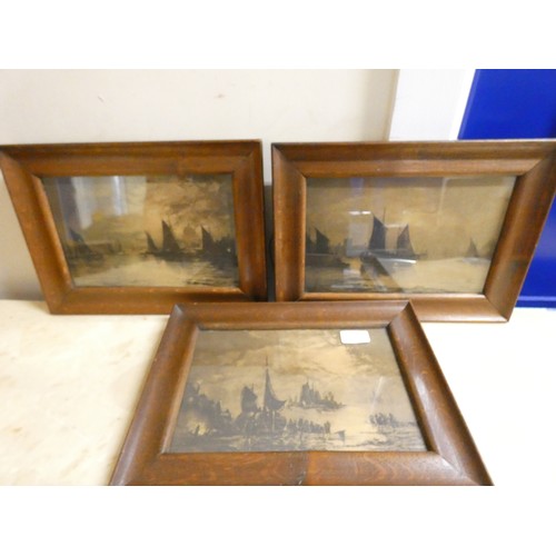 589 - Three monochrome prints of sailing barges, in the Thames & elsewhere, in oak frames.