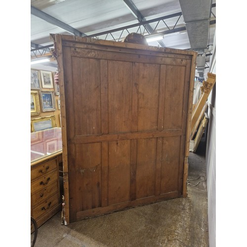 537 - 19th century gilt framed overmantel mirror, 213cm high x 180cm wide