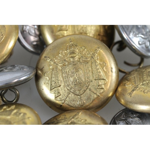 536 - Early 20thC French brass military uniform buttons, the back marked G and Cie. Paris 32, together wit... 