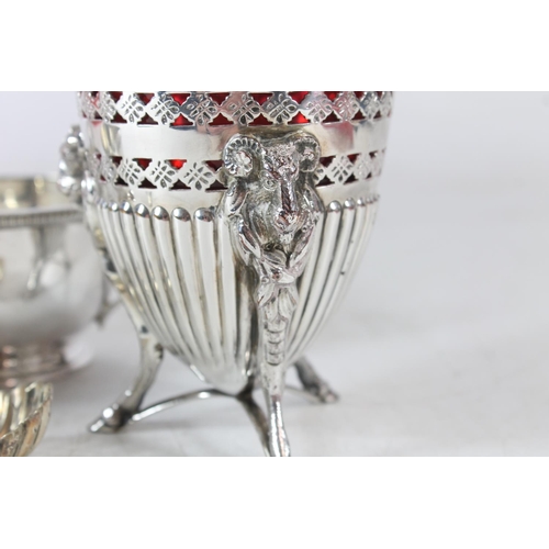 538 - Victorian silver plated sugar vase on tripod hoof footed support with amethyst glass liner, together... 