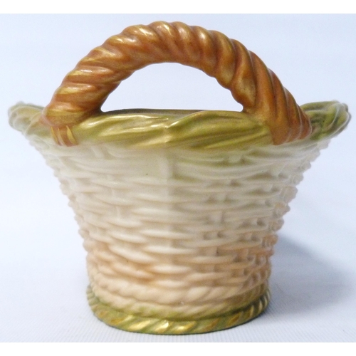 237 - Royal Worcester blush ivory twin-handled basket, c. 1905, with reticulated decoration, shape no. 236... 