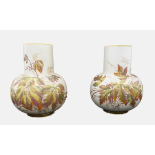 239 - Pair of Royal Worcester porcelain vases, c. early 20th century, painted with foliage to the neck and... 