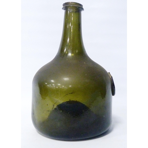 261 - George II period 18th century green glass wine bottle of mallet form, with raised circular seal bear... 