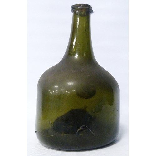 261 - George II period 18th century green glass wine bottle of mallet form, with raised circular seal bear... 