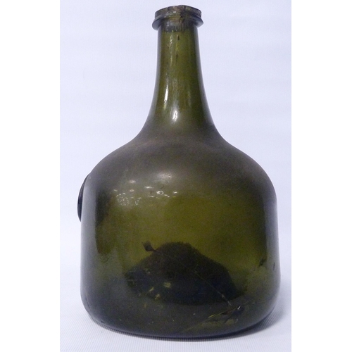 261 - George II period 18th century green glass wine bottle of mallet form, with raised circular seal bear... 