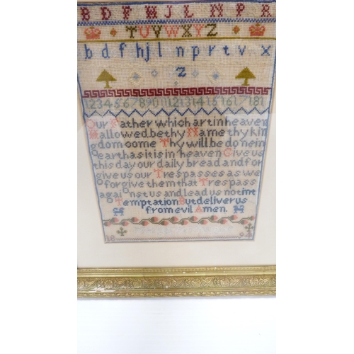 314 - Victorian needlepoint sampler worked by Margaret Thwane, 1894, with stitched alphabet above the Lord... 