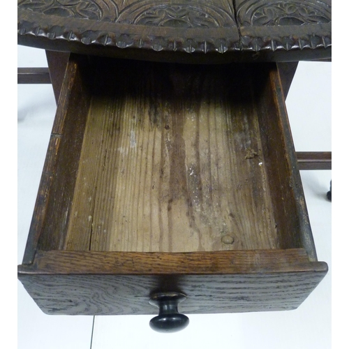 426 - Antique oak gate-leg supper table decorated with incised mouldings, united by beam understretchers, ... 