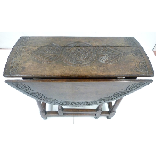 426 - Antique oak gate-leg supper table decorated with incised mouldings, united by beam understretchers, ... 