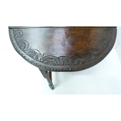 426 - Antique oak gate-leg supper table decorated with incised mouldings, united by beam understretchers, ... 