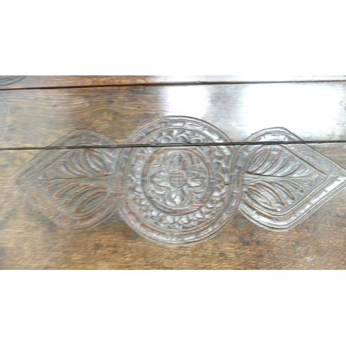 426 - Antique oak gate-leg supper table decorated with incised mouldings, united by beam understretchers, ... 