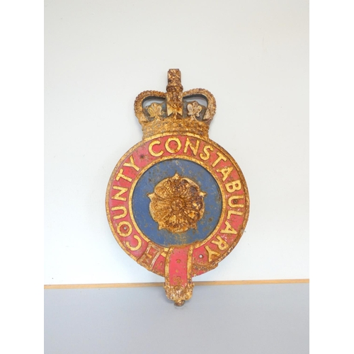 343 - 1930s painted cast iron County Constabulary circular wall plaque, with central rose beneath crown. H... 