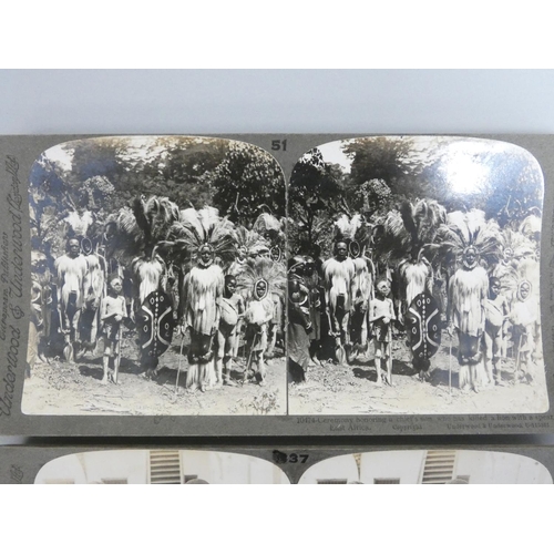 386 - Collection of early 20th century Underwood & Underwood stereoscopic slides predominantly coverin... 