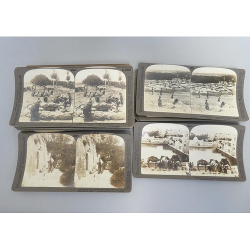 386 - Collection of early 20th century Underwood & Underwood stereoscopic slides predominantly coverin... 