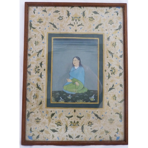 271 - 19th Century Mughal SchoolGuru in prayer poseGouache, 17cm x 12cm, within a floral backing, framed a... 