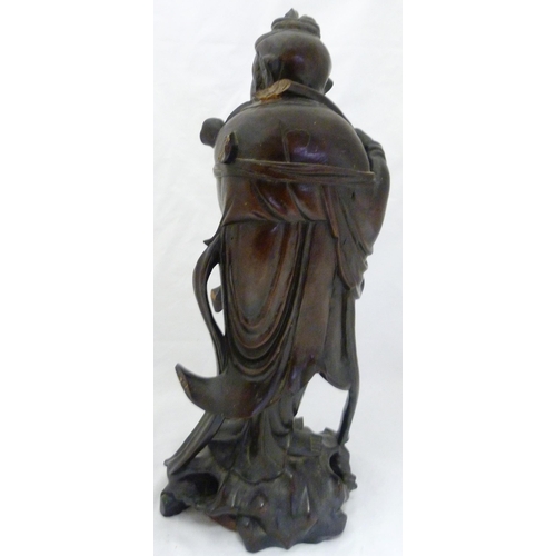 275 - Chinese carved hardwood sculpture, modelled as the goddess Guanyin holding a ruyi sceptre, fixed to ... 