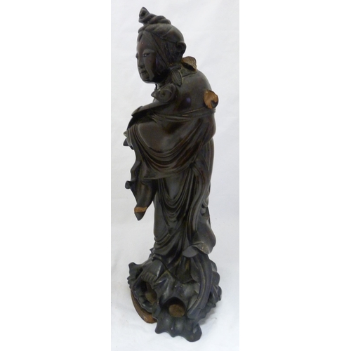 275 - Chinese carved hardwood sculpture, modelled as the goddess Guanyin holding a ruyi sceptre, fixed to ... 