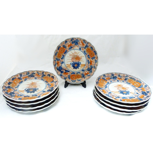 279 - Nine matching Japanese Imari plates (Meiji period, 1868 - 1912), each decorated with a floral bouque... 