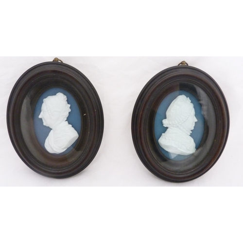 212 - James Tassie (Scottish, 1735 - 1799)Pair of white paste relief moulded portrait medallions depicting... 